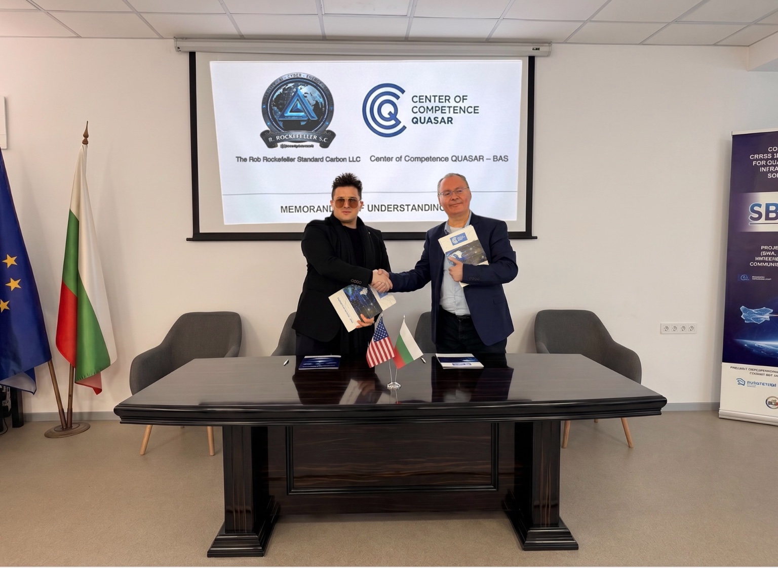 Valentino Loforese shaking hands with Assoc. Prof. Dr. Lachezar Georgiev after the QUASAR memorandum in Sofia